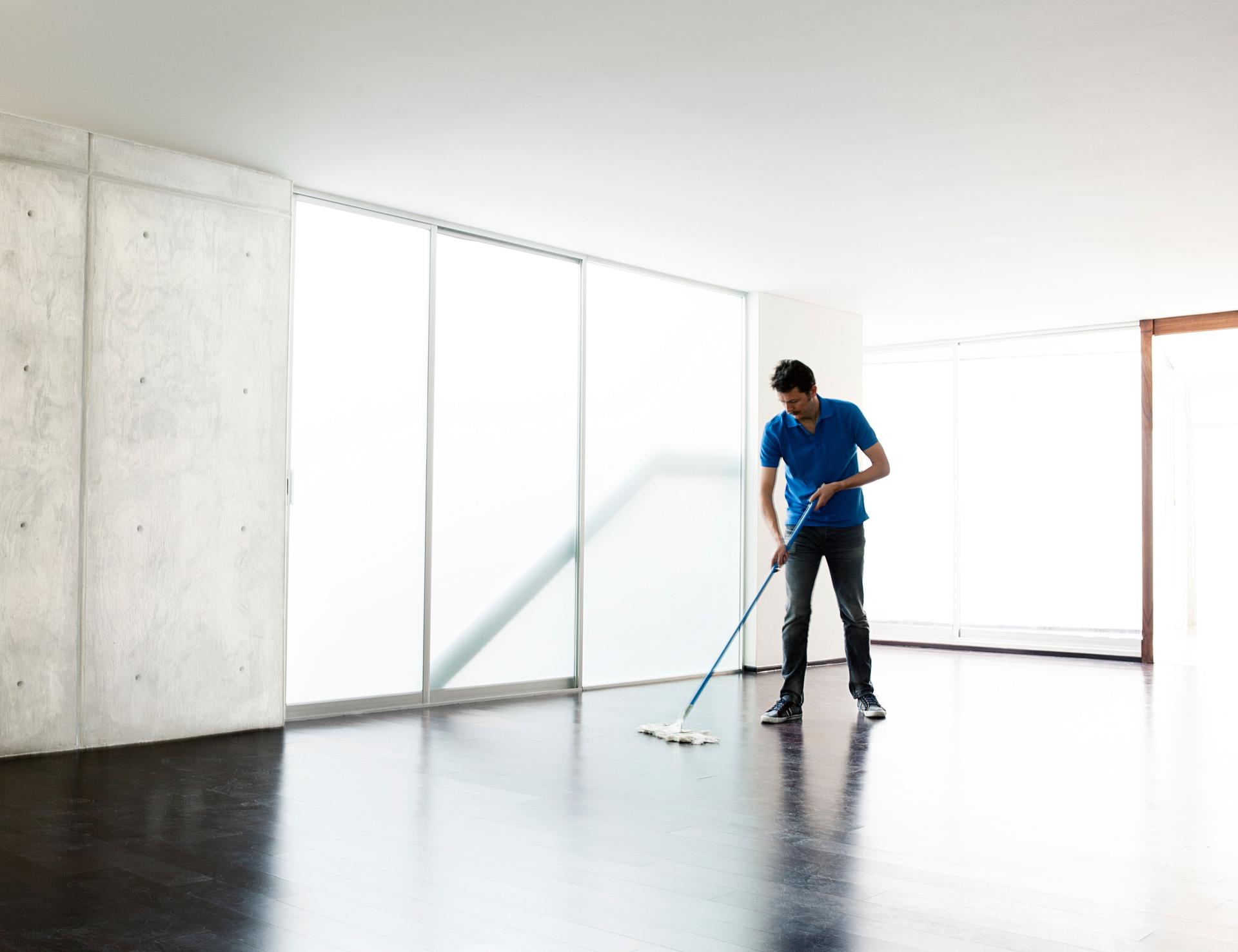 Man cleaning the floor